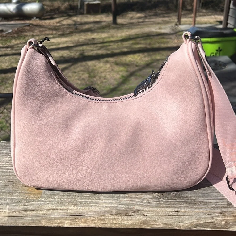 Juicy Couture Pink zip top Obsession Handbag with rhinestone logo